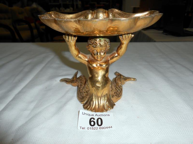 A solid brass dish surmounted by mermaid & a pair of brass candlesticks - Image 2 of 5