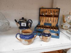 A Doulton stoneware 4 piece tea set & cased EPNS cutlery set A/F