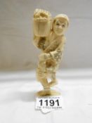 An antique ivory figure,