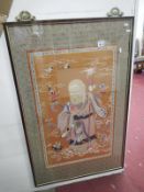 A large silk picture of a Buddha,