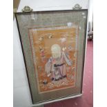 A large silk picture of a Buddha,