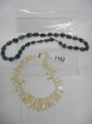 A vintage mother of pearl necklace and a lace agate necklace