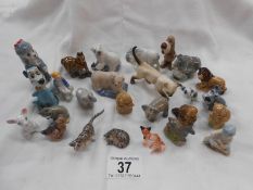 A quantity of miniature animal figures including Wade Disney & whimsies