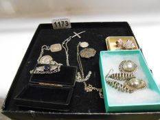 A mixed lot of silver brooches, silver earrings,