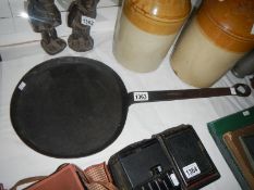 An 18th century skillet with marking on handle