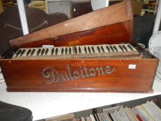 A mahogany cased DULCITONE travelling piano