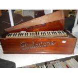 A mahogany cased DULCITONE travelling piano