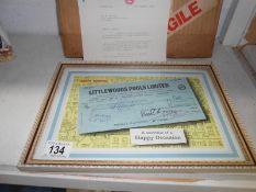 A 1962 Littlewoods pools winner cheque framed & glazed & accompanying letter