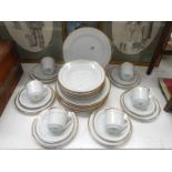 A 6 place setting white china dinnerware with gilded rims (30 pieces)