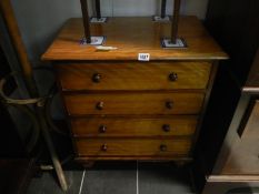 A Victorian mahogany commode in the form of a 4 drawer chest