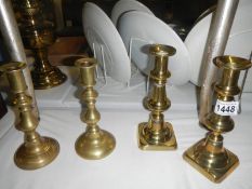 2 pairs of brass candlesticks