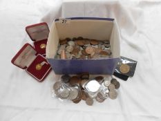 A box of mixed English coins