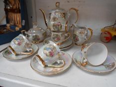 A Foreign porcelain tea set with classical scenes & gilded edges