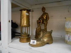 A brass miners lamp,