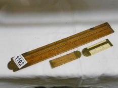 An antique ivory ruler by W H Brown,