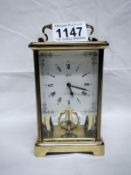 A brass Schatz carriage clock