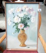 An oil on canvas of flowers in a brown vase signed N.R.