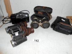 A pair of Carl Zeiss Silvaman binoculars & 1 other & A Canon Sure Shot AF7 camera