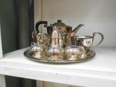 A silver plated tea set on tray