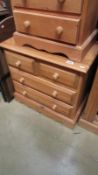 A small 2 over 3 chest of drawers