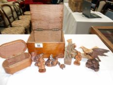 A quantity of carved wooden items & boxes