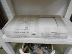 A new/unused box of Laura Ashley wall tiles