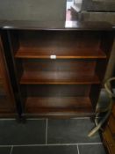 A darkwood stained mahogany effect bookcase
