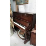 A Barratt & Robinson upright mahogany piano