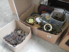 A quantity of clock parts including mechanisms & glass etc.