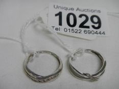 2 9ct white gold rings.