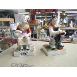 A pair of early Staffordshire figures, Jobson and Nell,