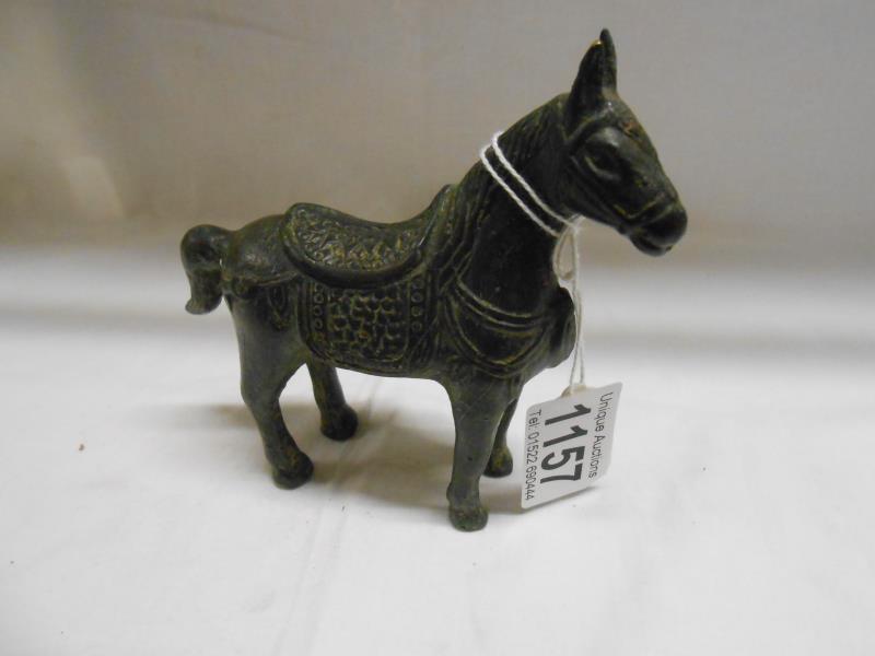 A small bronze tang horse
