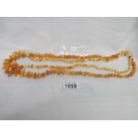 2 yellow amber necklaces