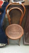 A Bentwood chair with cane seat