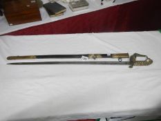 A late 19th century sword with chagrine hilt and brass bound scabbard (Whiteman Outfitters,