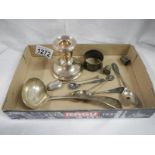 A silver ladle, 5 silver spoons, 2 silver thimbles,