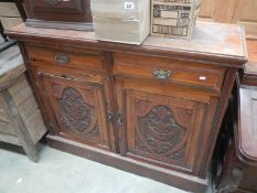 An Edwardian mahogany 2 drawer 2 door bookcase base