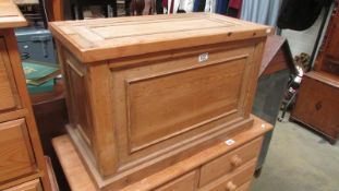 A solid reclaimed pine blanket box