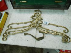 4 brass coat hangers & a coat hook