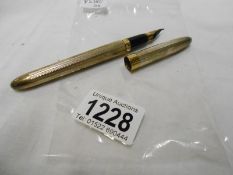 A Shaeffer sterling silver pen with 18ct gold nib
