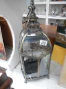 A metal & glass hall lantern