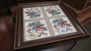 An ornate tray with 4 floral tiles inset