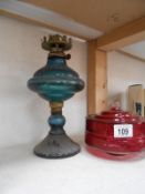 A Victorian ruby glass oil lamp font & a blue glass oil lamp