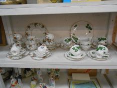 A Royal Crown Derby tea set (19 pieces) & an Empire tea set (21 pieces)