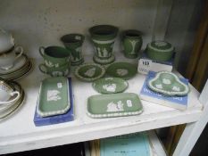 A quantity of green Wedgwood pin dishes & posy holders etc.