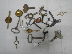 A quantity of antique clock keys etc