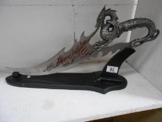 A Lord of the Rings sword on stand