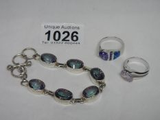 2 silver rings set topaz and a silver bracelet
