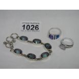 2 silver rings set topaz and a silver bracelet