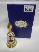 A boxed Royal Crown Derby Old Imari pattern candle snuffer